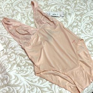 Lace comfort body suit.